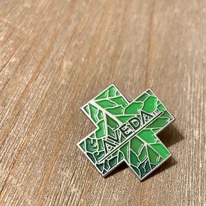 Aveda Green Leaf Cross Enamel Pin